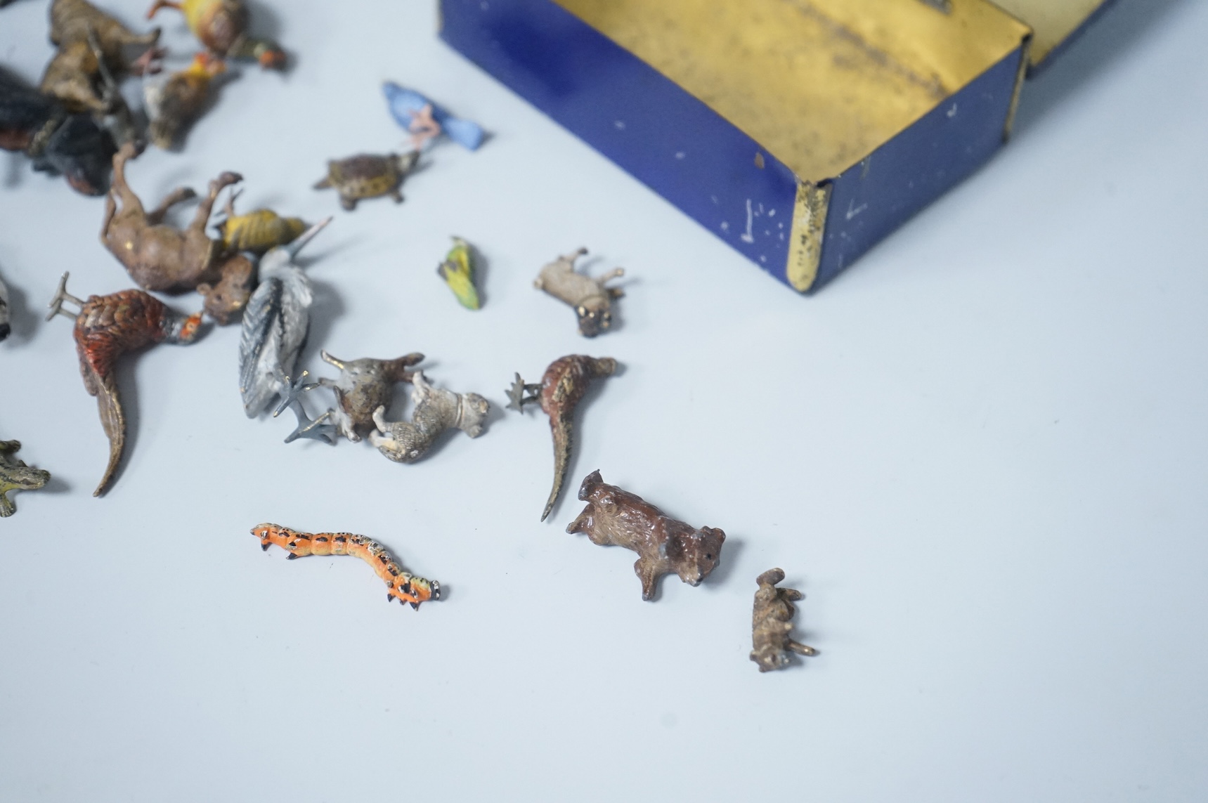 A group of Austrian miniature cold painted bronze and spelter animal and bird figures, largest 6cm wide